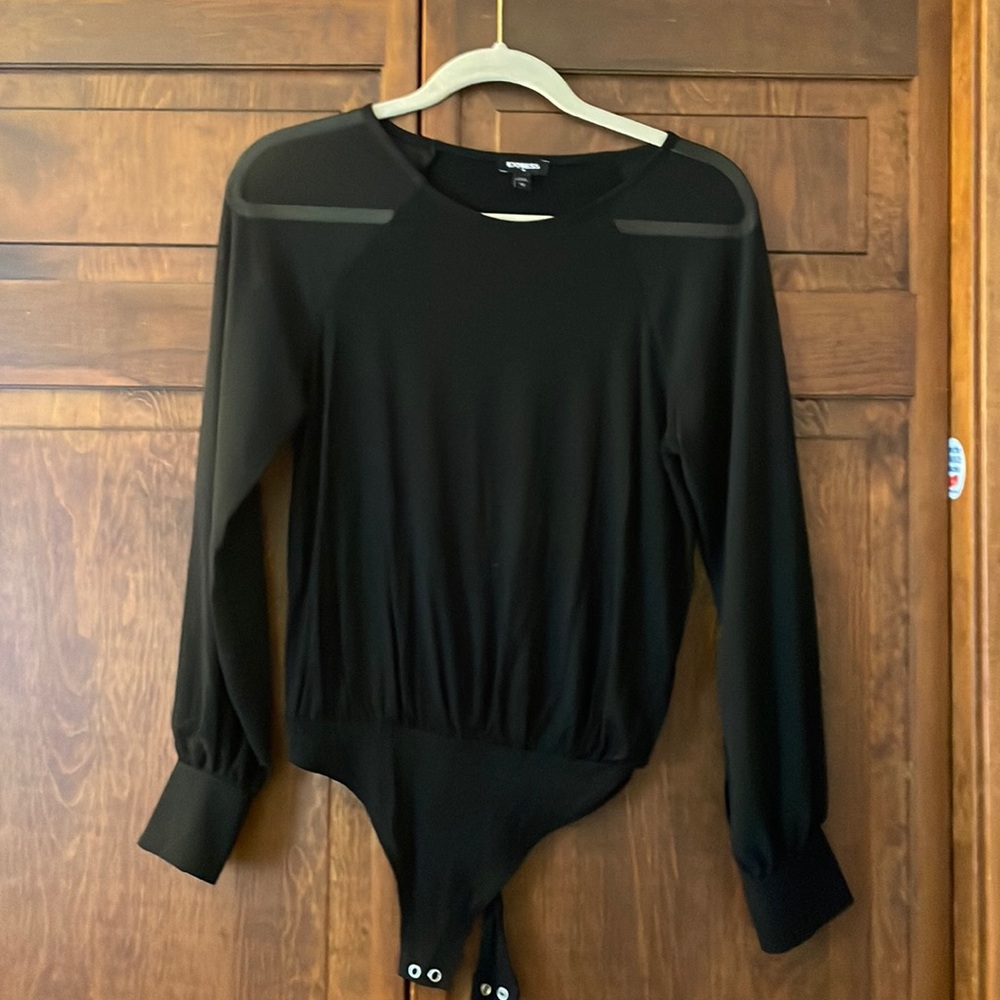 Black, sheer sleeves, super comfortable! No tags but never worn!